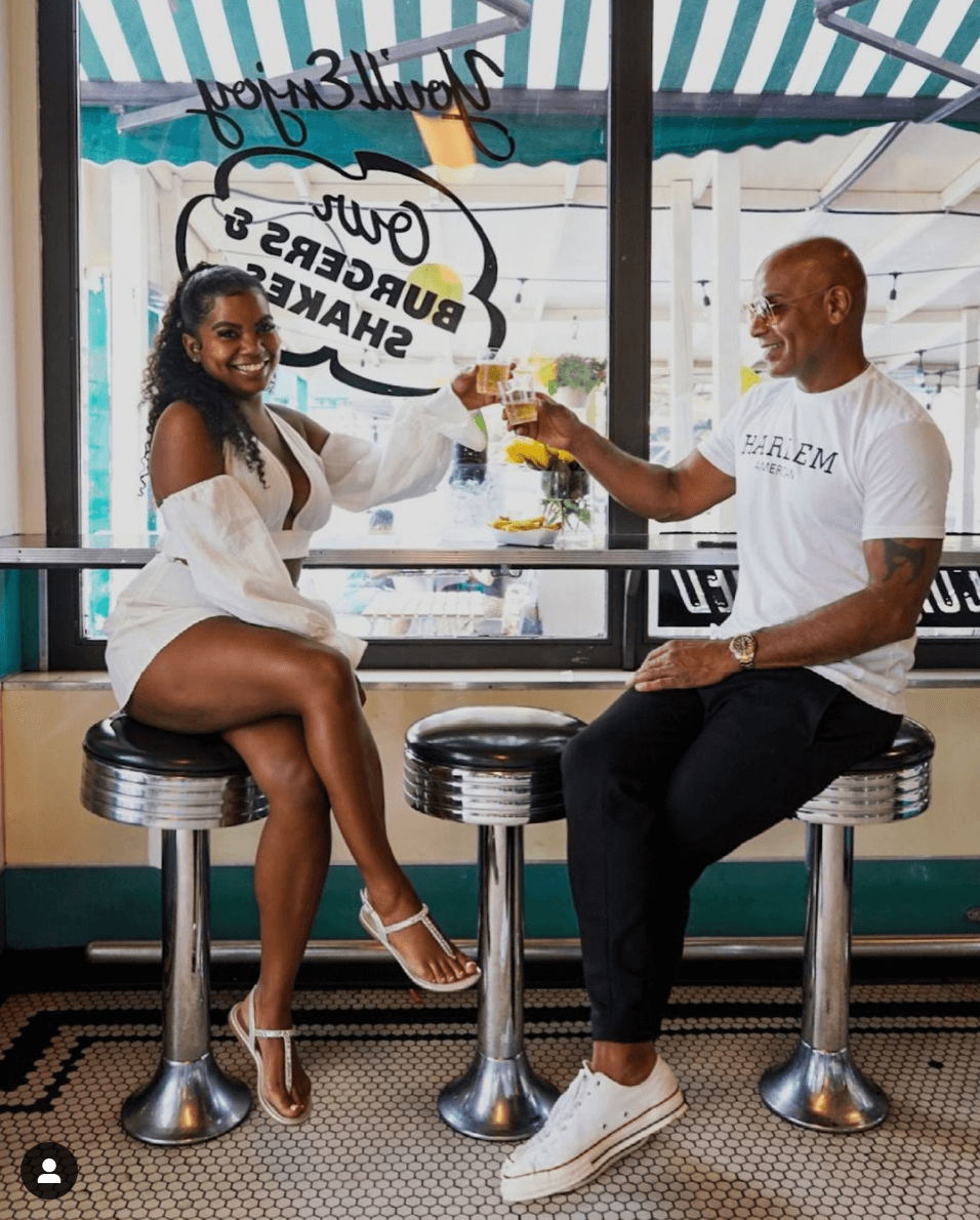 two people enjoying harlem shake burgers